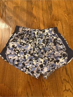 Nike Women’s Navy and Light Blue Floral Athletic Shorts